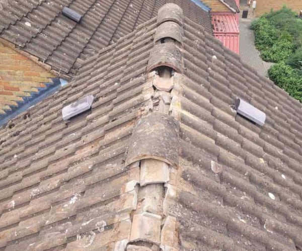 This is a photo if a roof ridge which has missing tiles. The ridge tiles are being replaced by ES Roofing Adwick Le Street